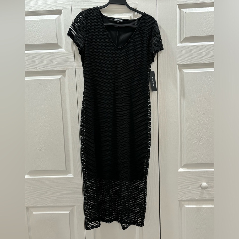 bebe black cap sleeve fishnet dress